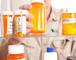 prescription-medication-bottles-in-a-medicine-cabinet