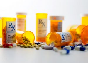 prescription-pill-bottles-with-spilled-pills